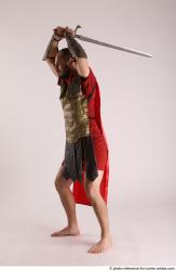 Man Adult Average White Fighting with sword Standing poses Casual